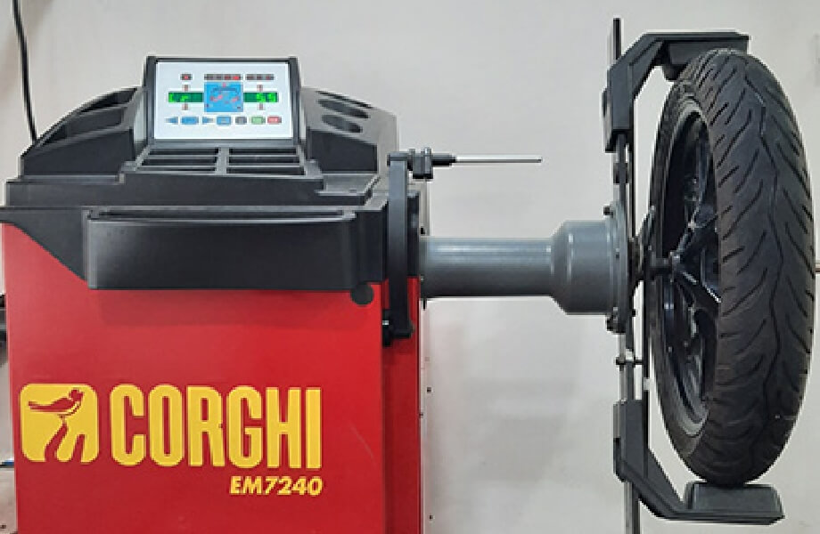 Specialized Two-Wheeler Tyre Changer with Rim Adaptors.